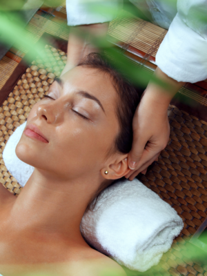 Woman receiving Thai inspired massage at spa in Arlington, TX