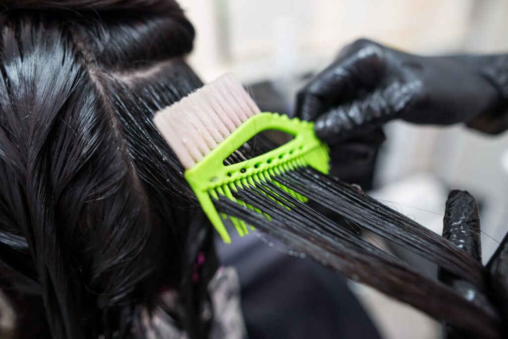 Hair Straightening Treatments - Hair being straightened